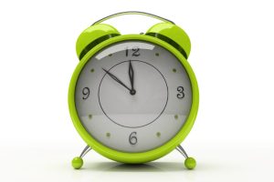 Green alarm clock isolated on white background 3D