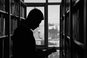 silhouette in library stacks