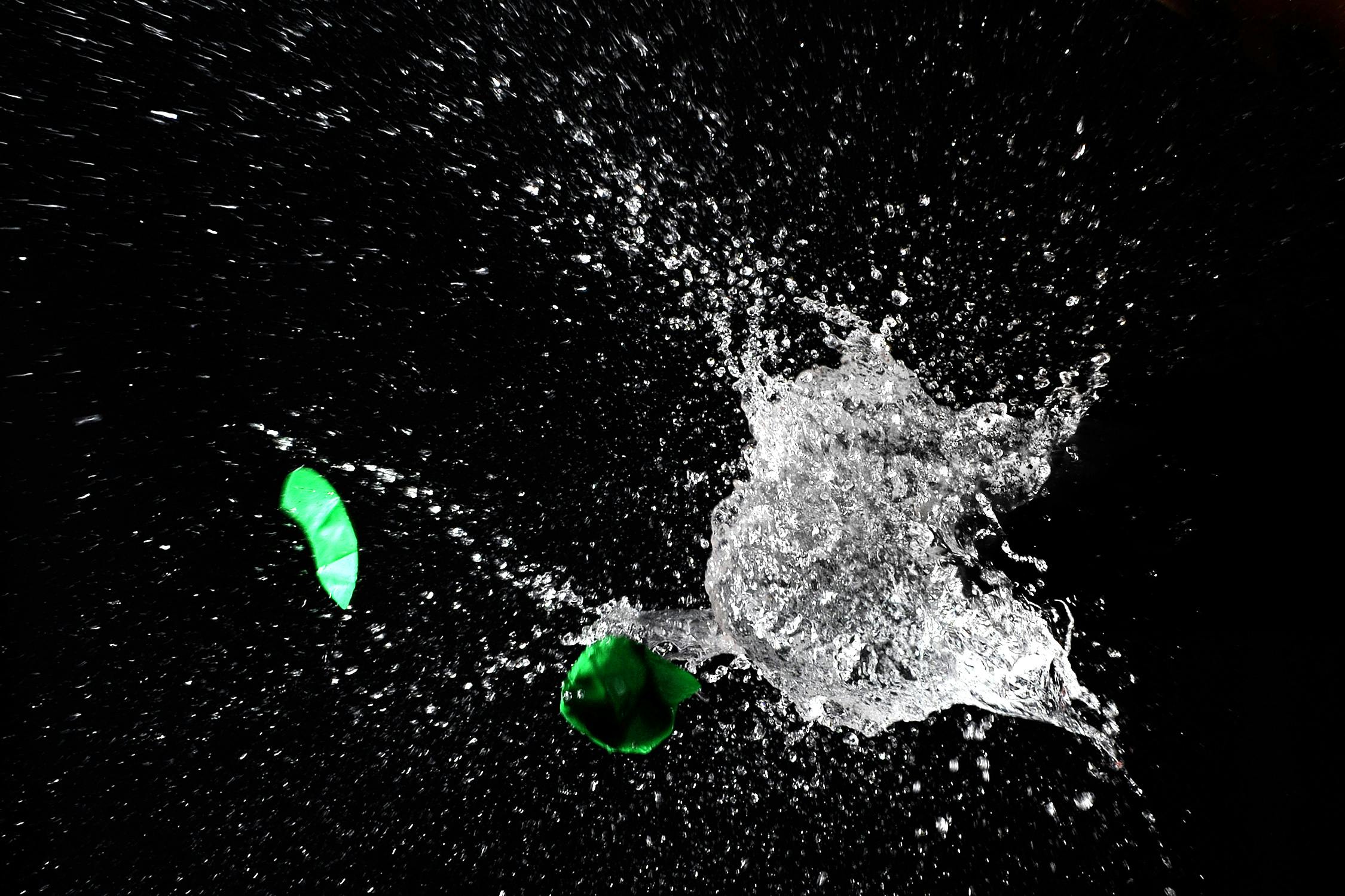 green water balloon popping