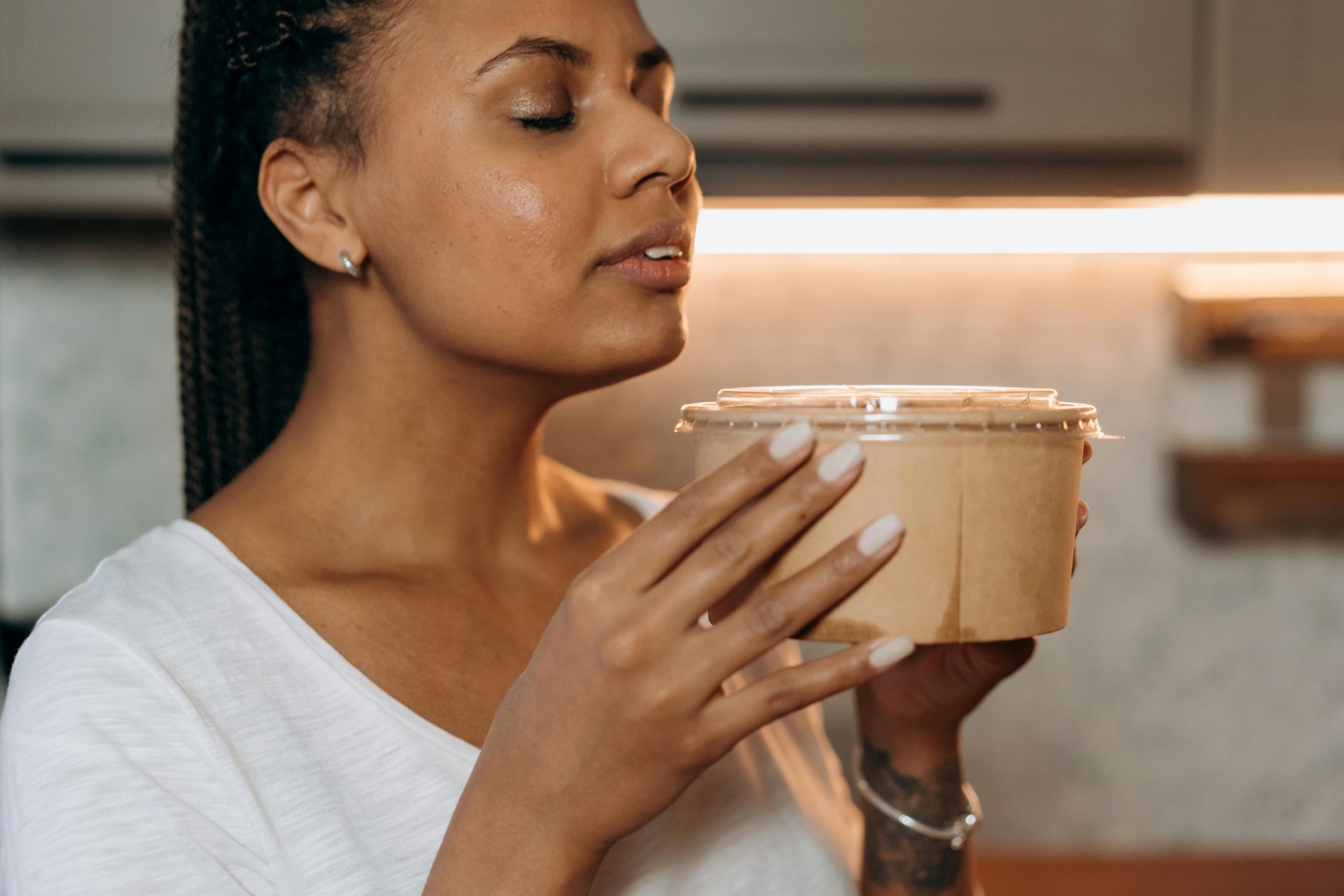 woman using pot pourri