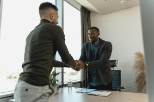 Interviewer and interviewee shaking hands
