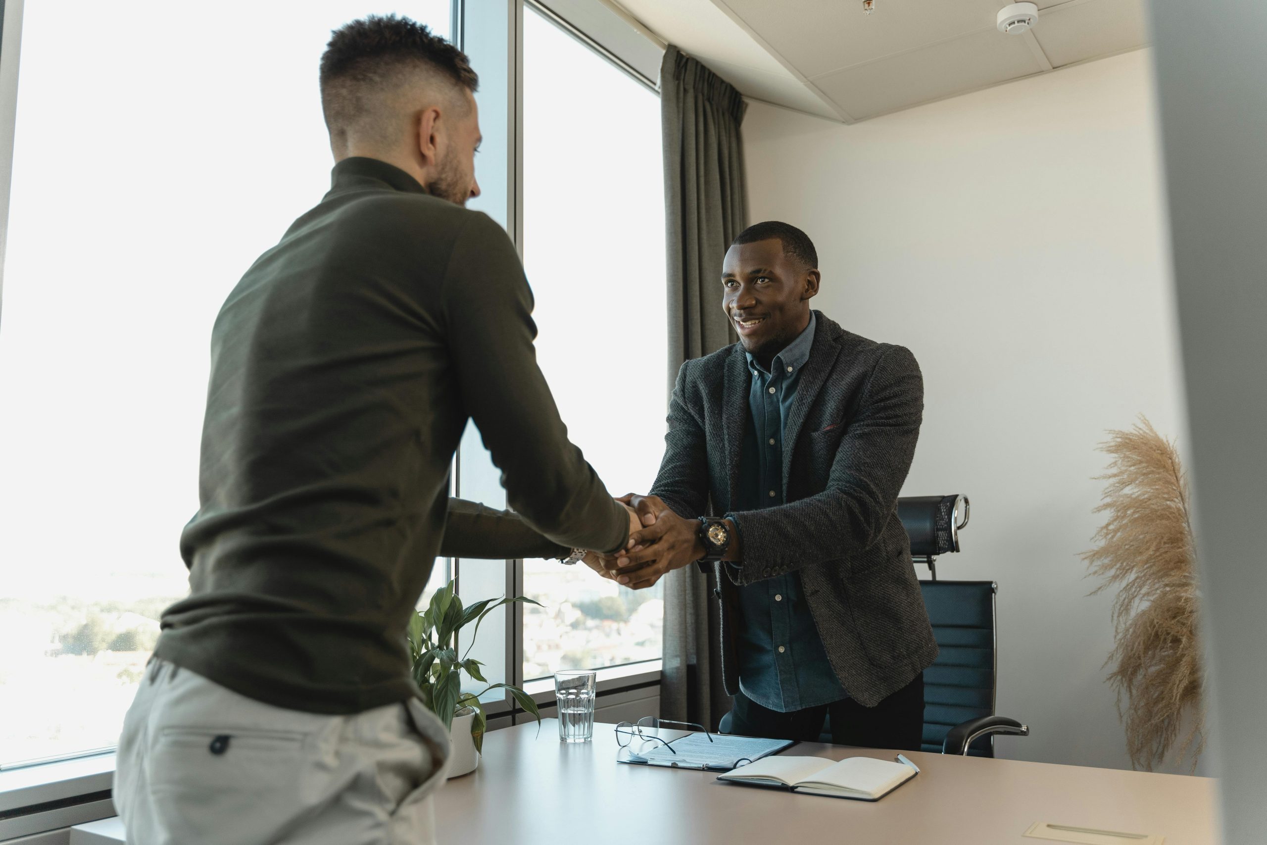 Interviewer and interviewee shaking hands