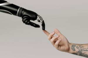 human finger and robot finger touching