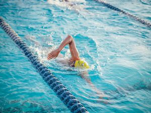 swimmer in a pool swim lane